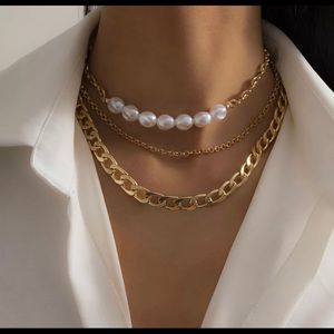 Layered gold necklace with fresh water pearls